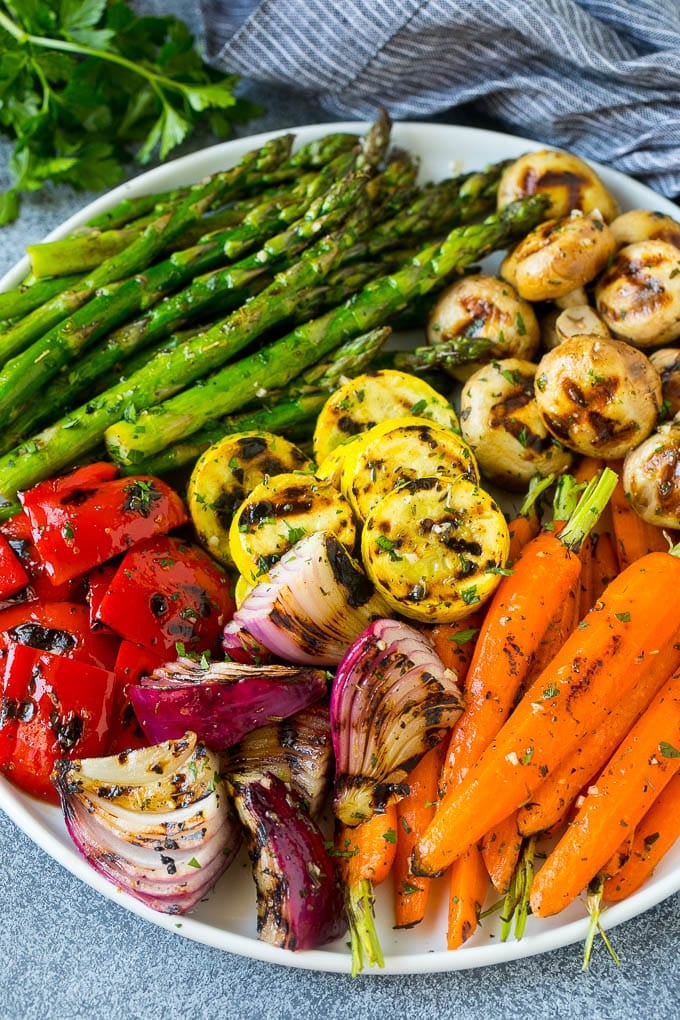 Grilled Vegetables Recipe | Marinated Vegetables | Grilled Veggies #vegetables #veggies #grilling #glutenfree #lowcarb #keto #dinner #ezlod #cleaneating #healthy A colorful platter of grilled vegetables flavored with garlic and herbs.