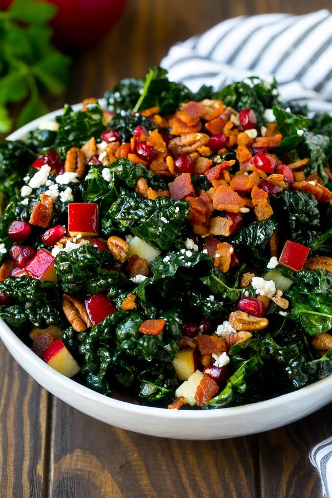 Apple Kale Salad Recipe | Kale Recipe | Fall Salad #kale #apples #bacon #salad #feta #dinner #lunch #ezlod Apple kale salad topped with bacon and pecans.