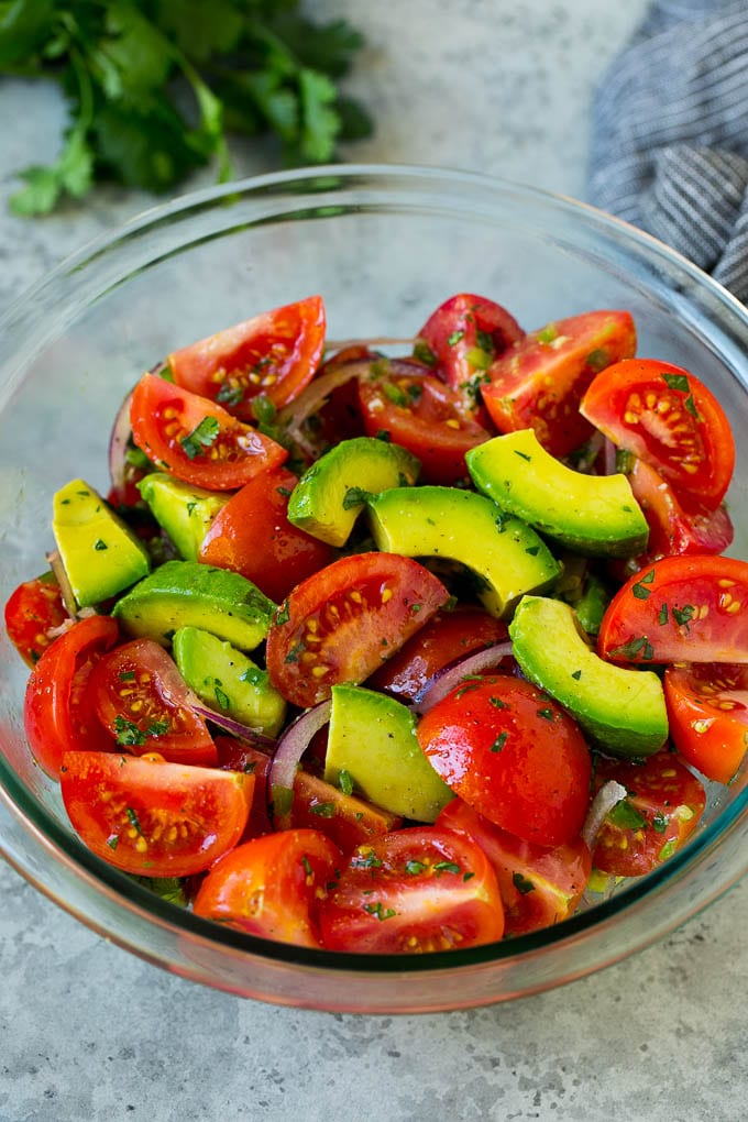 Tomato Avocado Salad Recipe | Avocado Salad | Tomato Salad #salad #tomato #avocado #glutenfree #cleaneating #dinner #ezlod #healthy Tomato avocado salad with red onion and a cilantro lime dressing.