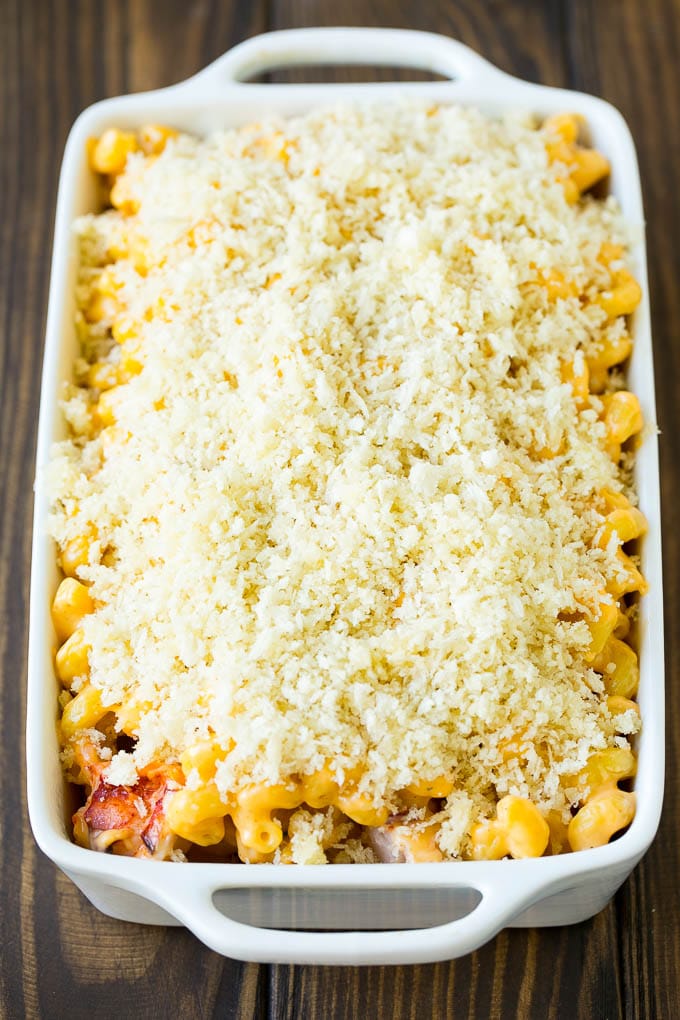 Lobster Mac and Cheese Recipe | Lobster Macaroni and Cheese | Baked Mac and Cheese #pasta #macandcheese #macaroni #lobster #cheese #dinner #ezlod A casserole dish of lobster mac and cheese topped with panko breadcrumbs.