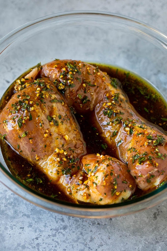 Marinated Pork Tenderloin Recipe | Pork Tenderloin Marinade | Pork Marinade #pork #porktenderloin #marinade #dinner #grilling #ezlod Pork tenderloins in a bowl of marinade.