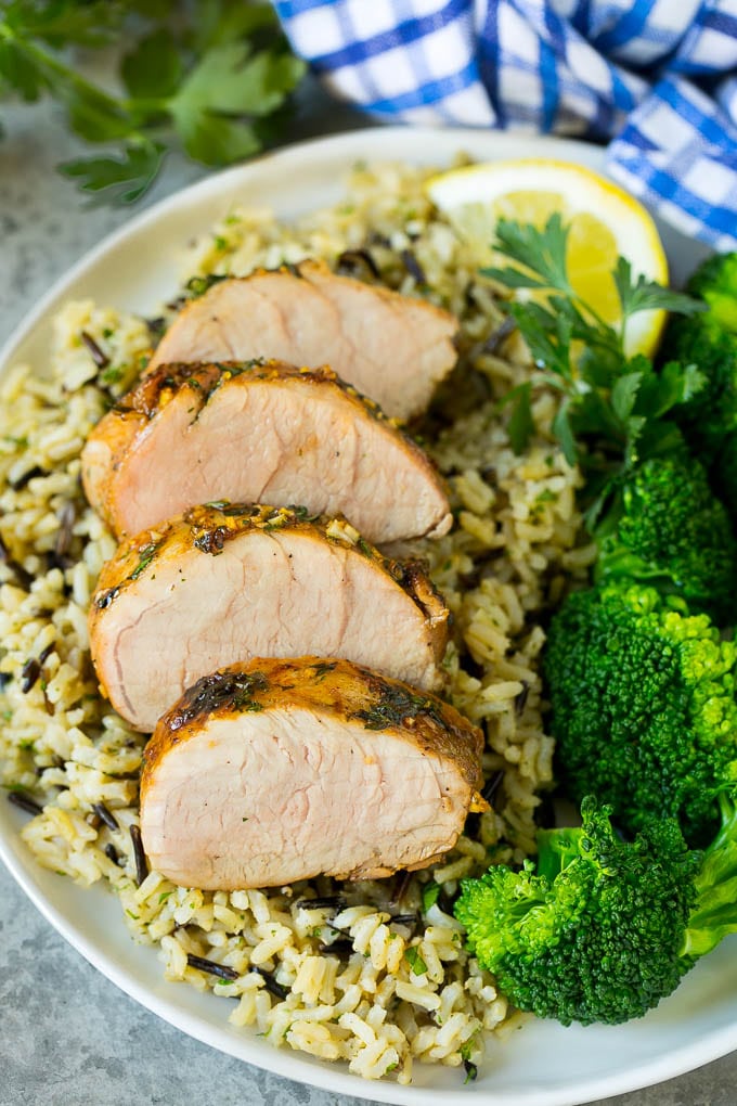 Marinated Pork Tenderloin Recipe | Pork Tenderloin Marinade | Pork Marinade #pork #porktenderloin #marinade #dinner #grilling #ezlod Pork tenderloin marinade over sliced pork, served with rice and broccoli.