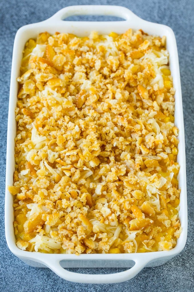 Scalloped Corn | Corn Casserole #corn #casserole #cheese #sidedish #dinner #ezlod Scalloped corn topped with crushed crackers and shredded cheese.