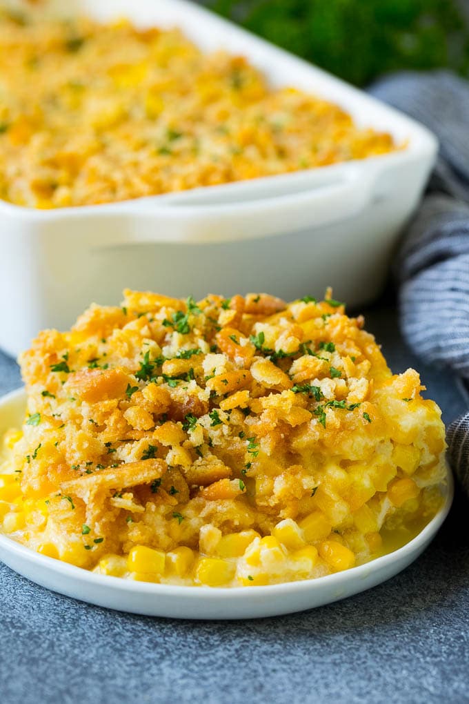 Scalloped Corn | Corn Casserole #corn #casserole #cheese #sidedish #dinner #ezlod A serving of scalloped corn topped with buttery cracker crumbs.