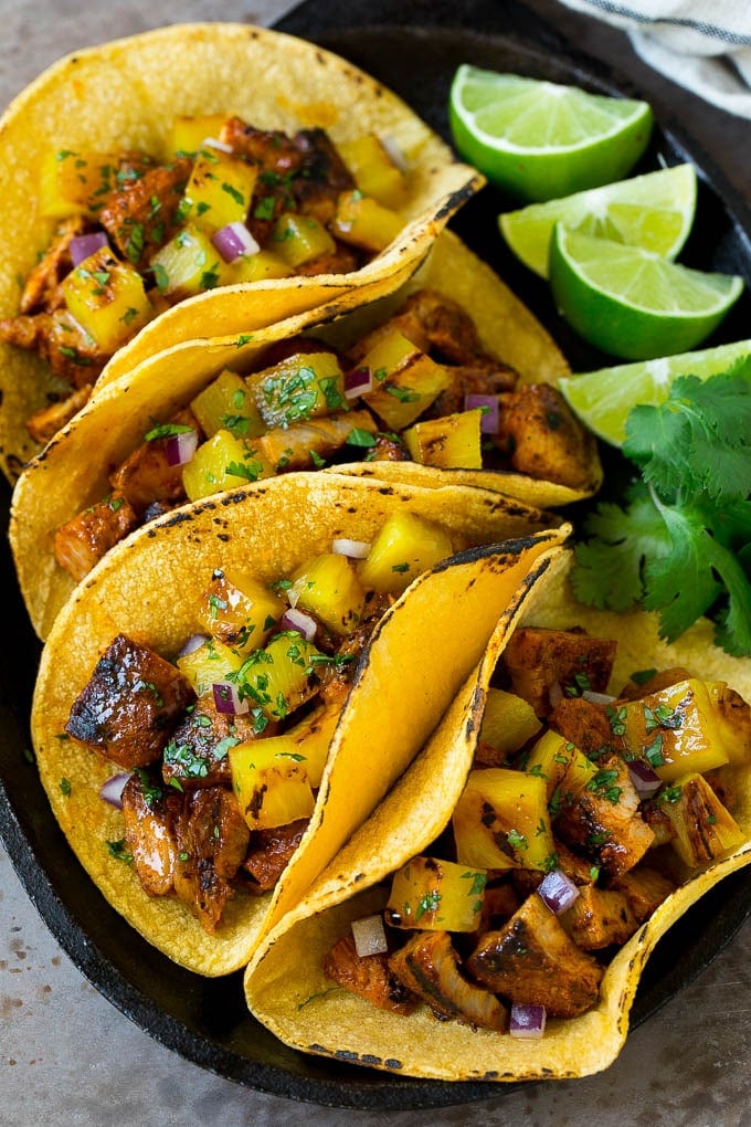 Tacos al Pastor Recipe | Pork Tacos | Mexican Tacos #tacos #pork #pineapple #grilling #tacotuesday #dinner #ezlod Tacos al pastor filled with marinated pork and pineapple.