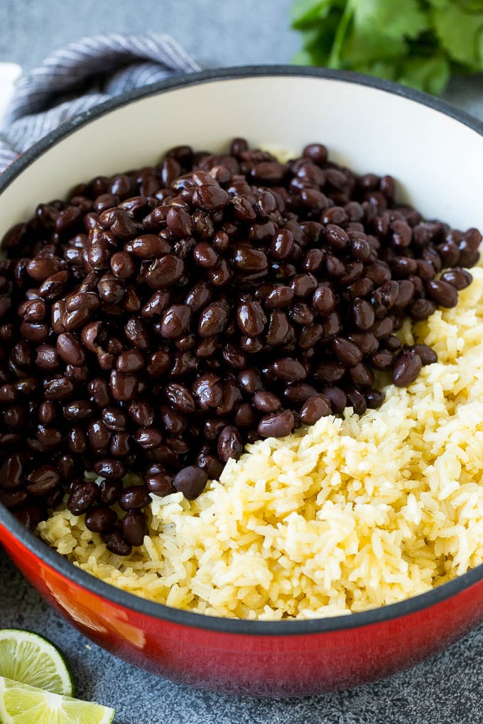 Black Beans and Rice Recipe | Cuban Black Beans | Beans and Rice #beans #rice #blackbeans #sidedish #glutenfree #dinner #ezlod Cooked rice and black beans in a pot.
