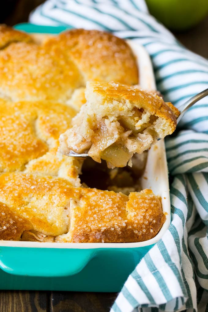 Apple Cobbler Recipe | Apple Dessert #apples #cobbler #dessert #baking #fall #ezlod A spoonful of apple cobbler in the serving dish.