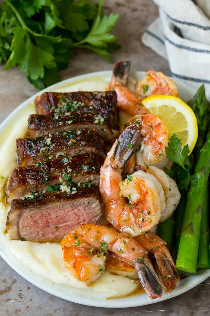 Surf and Turf Recipe | Seared Steak #steak #shrimp #keto #lowcarb #dinner #ezlod Surf and turf with steak, shrimp, mashed potatoes and asparagus.