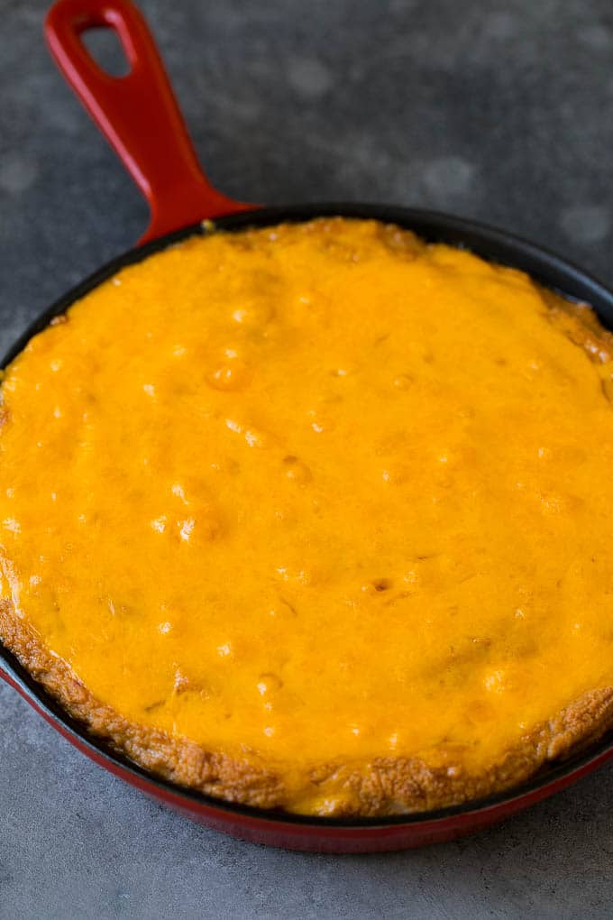 Bean Dip Recipe | Mexican Dip #dip #appetizer #mexicanfood #beans #cheese #ezlod Baked refried beans topped with melted cheddar cheese.