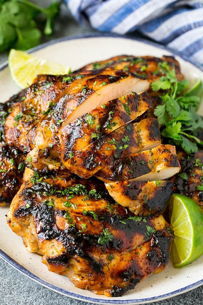 Grilled Chicken Thighs Recipe | Marinated Chicken Thighs #chicken #grilling #marinade #dinner #cilantro #lime #ezlod Sliced grilled chicken thighs with cilantro and lime flavoring.