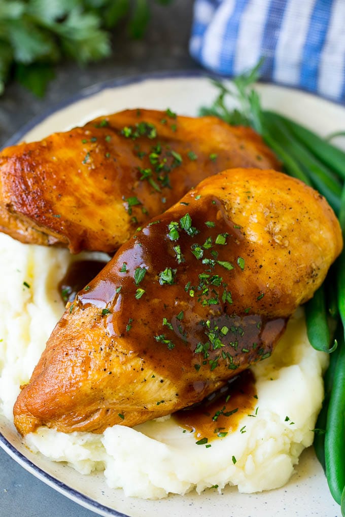 Slow Cooker Chicken Breast Recipe | Crock Pot Chicken Breast | Chicken and Gravy #chicken #slowcooker #crockpot #gravy #dinner #ezlod Slow cooker chicken breast served with mashed potatoes and green beans.