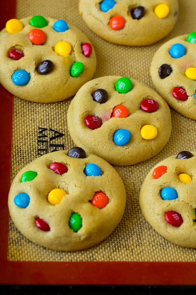 M&M Cookies Recipe #cookies #chocolate #baking #dessert #sweets #ezlod Baked cookies on a sheet pan.