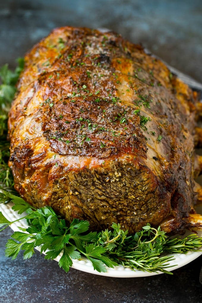 Prime Rib Recipe #primerib #beef #roast #dinner #thanksgiving #christmas #keto #lowcarb #ezlod A slow roasted prime rib on a serving platter.