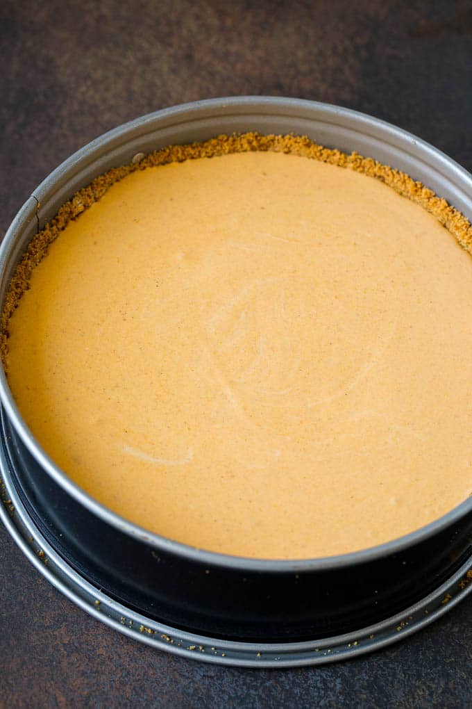 Pumpkin Pie Cheesecake Recipe | Pumpkin Cheesecake #cake #cheesecake #pumpkin #fall #thanksgiving #dessert #ezlod Cheesecake batter in a baking pan.