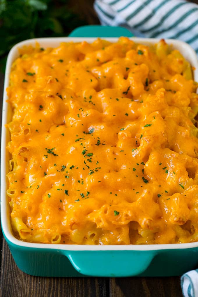 Southern Mac and Cheese | Baked Macaroni and Cheese #pasta #macandcheese #dinner #comfortfood #cheese #ezlod Southern mac and cheese topped with melted cheddar and parsley.