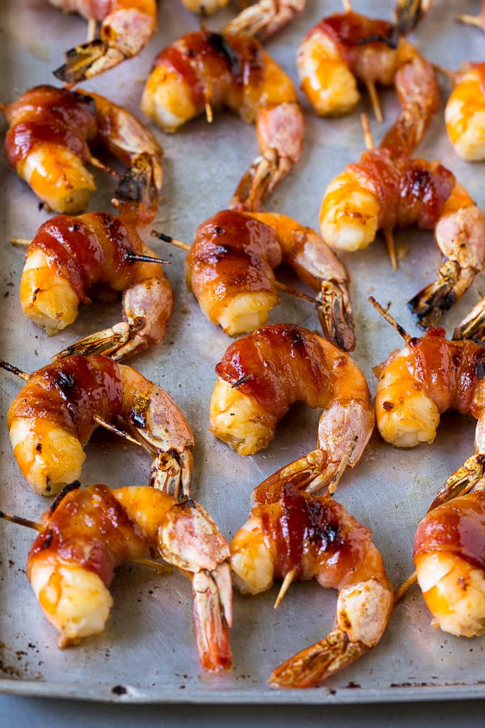 Bacon Wrapped Shrimp Recipe | Bacon Shrimp #shrimp #bacon #appetizer #dinner #ezlod #seafood Roasted shrimp with a piece of bacon around each one.