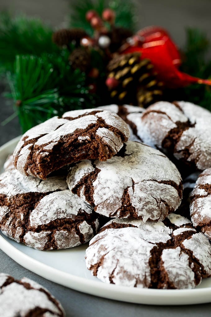 Chocolate Crinkle Cookies Recipe #cookies #chocolate #christmas #dessert #baking #ezlod A plate of chocolate crinkle cookies.