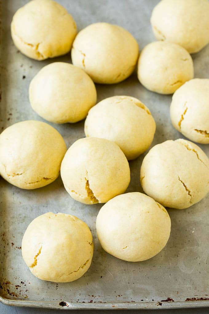 Italian Cookies Recipe | Almond Cookies #cookies #italianfood #frosting #sprinkles #baking #christmas #ezlod Baked almond cookies on a baking sheet.