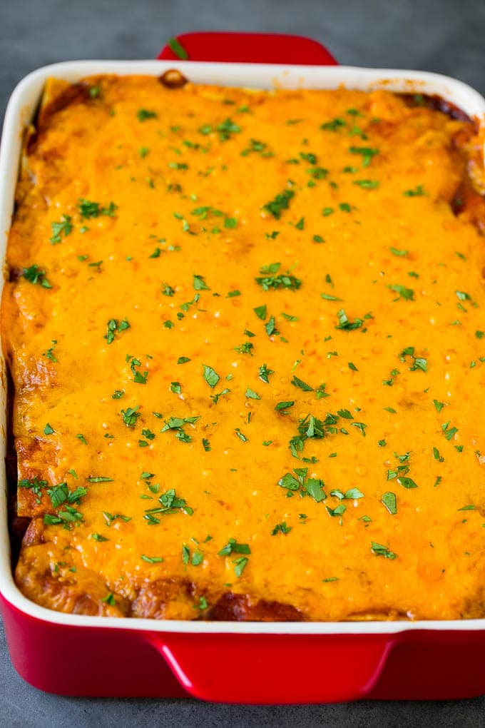 Mexican Lasagna Recipe | Mexican Casserole #mexican #lasagna #groundbeef #beans #dinner #cheese #ezlod A baked Mexican casserole topped with melted cheese and cilantro.