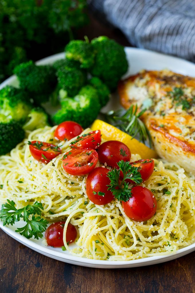 Garlic and Herb Angel Hair Pasta #pasta #garlic #sidedish #dinner #ezlod Angel hair pasta served with chicken and broccoli.