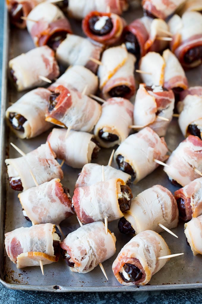 Bacon Wrapped Dates #appetizer #bacon #dates #cheese #ezlod Dates wrapped in bacon and secured with toothpicks.