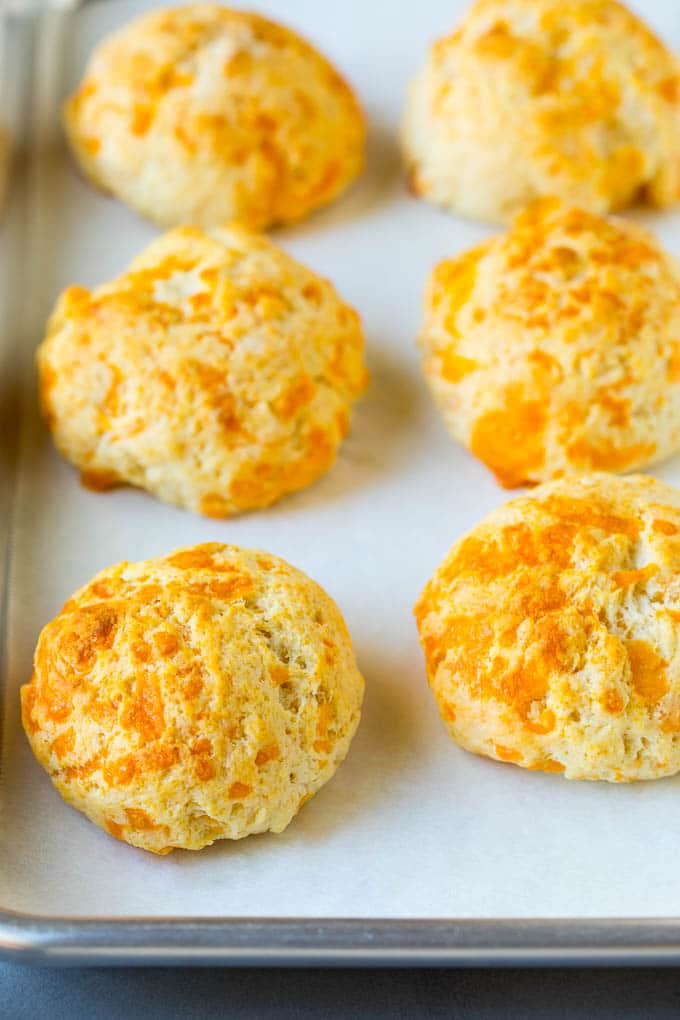 Chicken Pot Pie Soup Recipe | Chicken Soup #soup #chicken #dinner #comfortfood #ezlod Baked biscuits on a sheet pan.