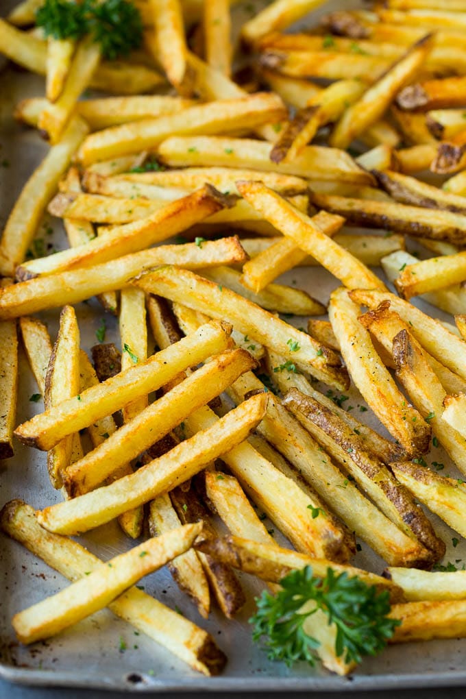 Homemade French Fries Recipe #potatoes #fries #dinner #ezlod Homemade french fries on a sheet pan.