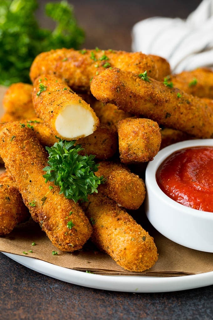 Mozzarella Sticks Recipe #cheese #appetizer #ezlod Mozzarella sticks served with a side of marinara sauce.