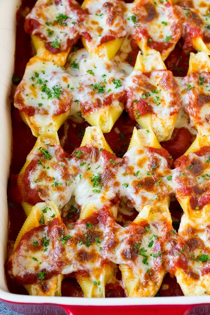 Baked stuffed shells filled with three types of cheese and topped with marinara sauce. #pasta #ezlod Baked stuffed shells filled with three types of cheese and topped with marinara sauce.