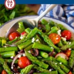 This asparagus salad is tender asparagus, tomatoes, olives, red onion and radishes, all tossed in a homemade dressing and topped with feta cheese.
