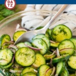 This cucumber dill salad is fresh sliced cucumbers, red onions and plenty of dill, all tossed together in a homemade dressing.