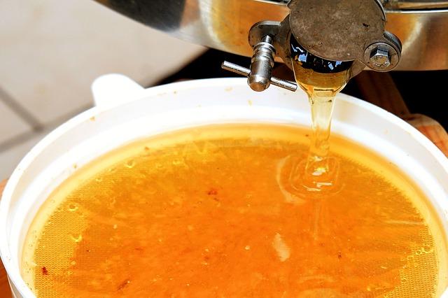 Honey coming out of an extractor