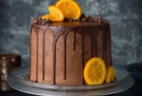 Vibrant Vegan Orange Almond Cake with Decadent Chocolate Frosting