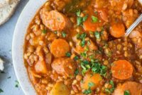 Hearty Vegan Sausage, Lentil, and Farro Bake