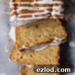 Zesty Lemon-Glazed Vegan Zucchini Cake 7 Close up of sliced vegan courgette loaf cake.