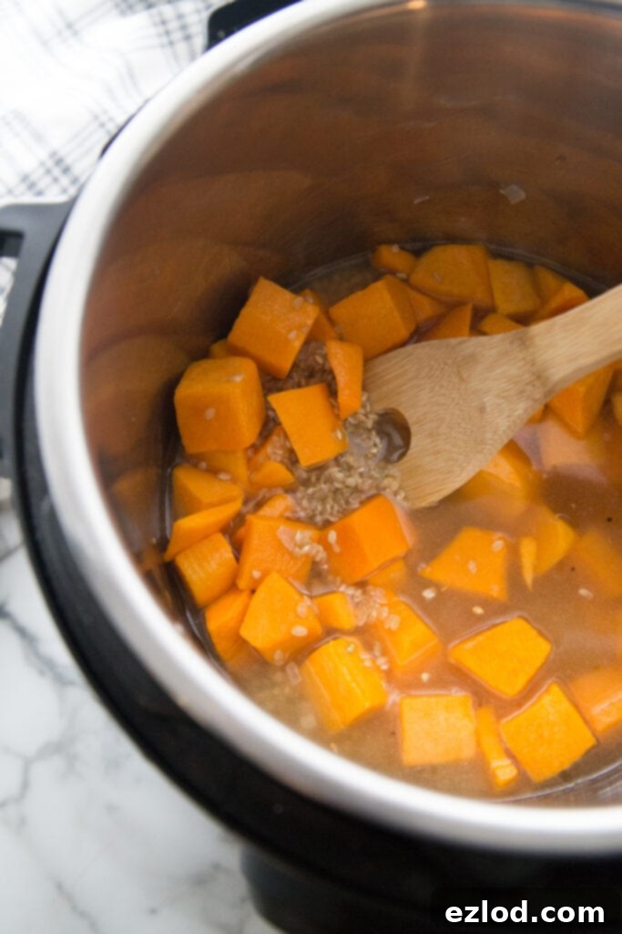 Butternut Squash Risotto garnished with fresh herbs