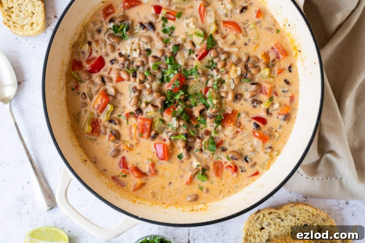 The cooked soup in a white cast iron pan, ready to serve.