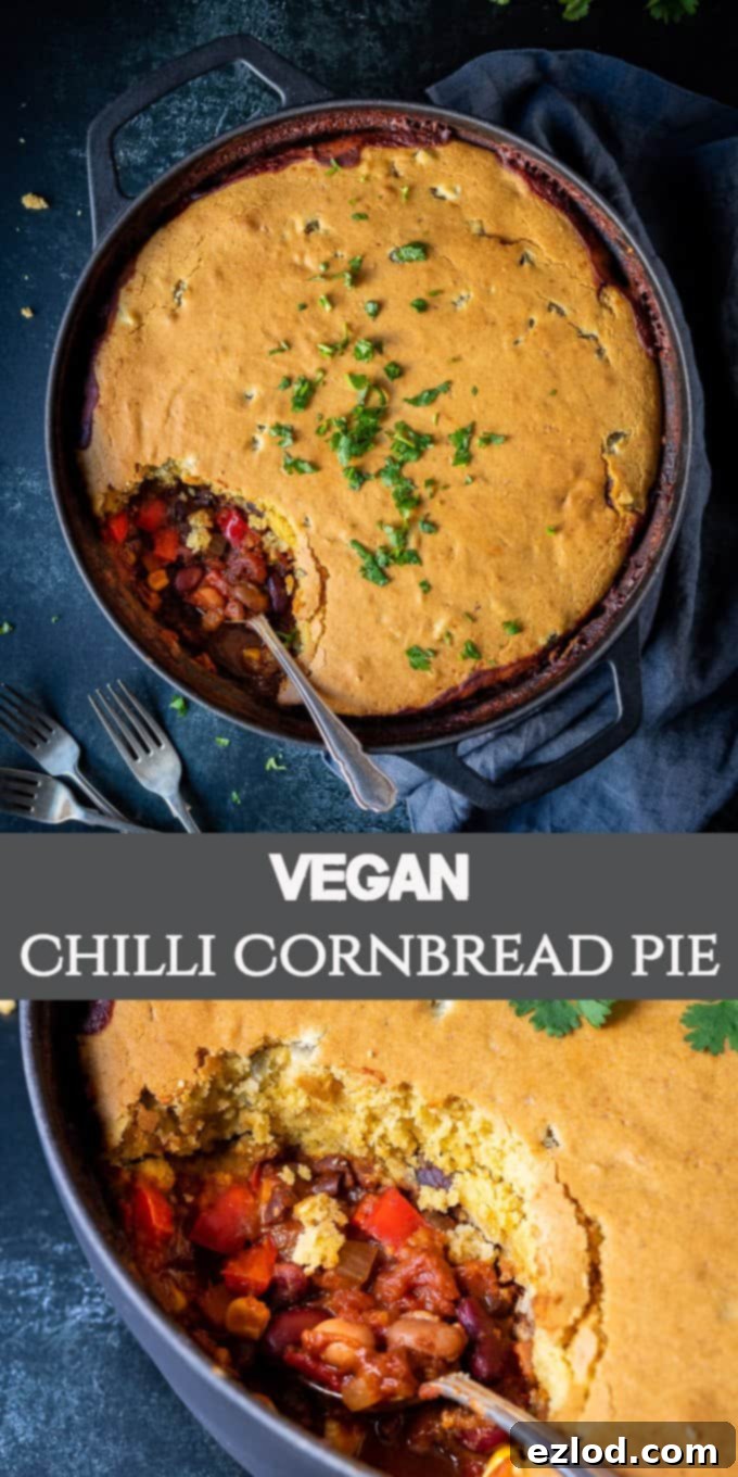 Vegan chili cornbread pie pinterest image, a tall vertical shot of the finished dish for social media sharing.