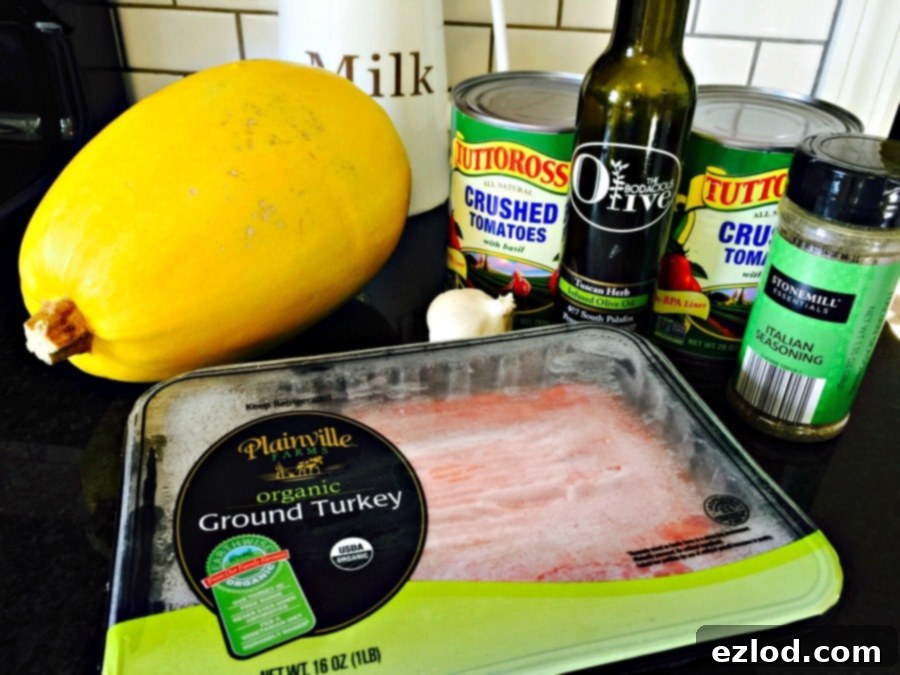 Fresh ingredients laid out for making a simple Crock Pot Spaghetti Squash with Meat Sauce recipe
