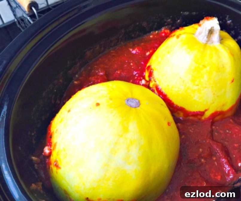 Crock Pot spaghetti squash with hearty meat sauce, steaming hot and ready to serve