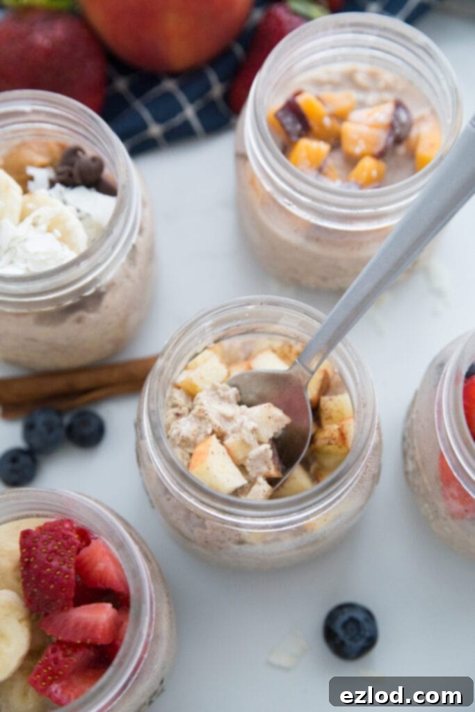 Overnight Oats in a glass jar with fresh berries and nuts, a healthy and convenient pantry breakfast.