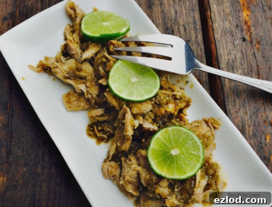 Slow Cooker Salsa Verde Pork, shredded and ready to serve.