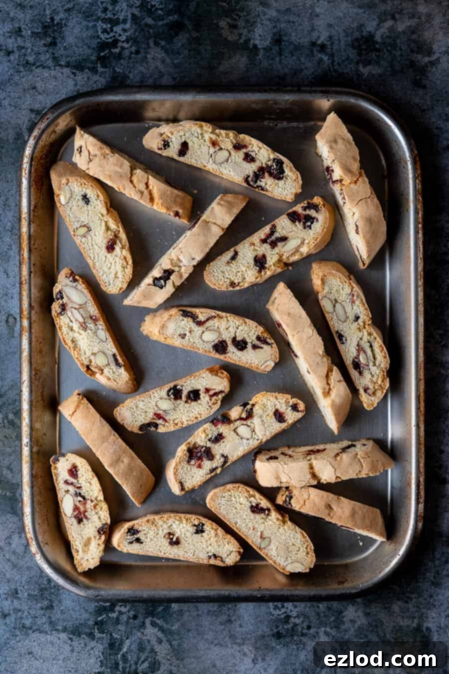 vegan cantuccini on a metal baking tray.