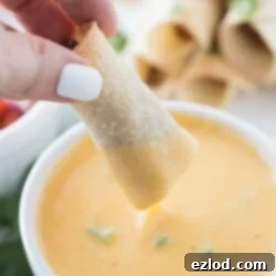 Crispy Taquitos with Homemade Cheese Sauce