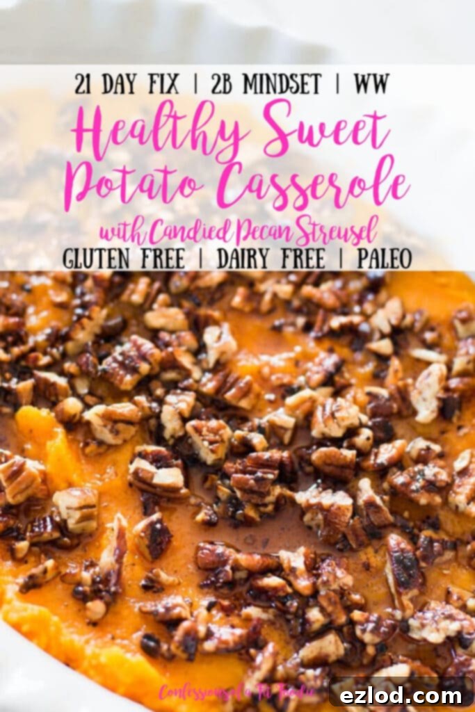 Close up photo of healthy sweet potato casserole topped with pecans, with the text overlay- 21 Day Fix | 2B Mindset | WW | Healthy Sweet Potato Casserole with Candied Pecan Streusel | Gluten Free | Dairy Free | Paleo