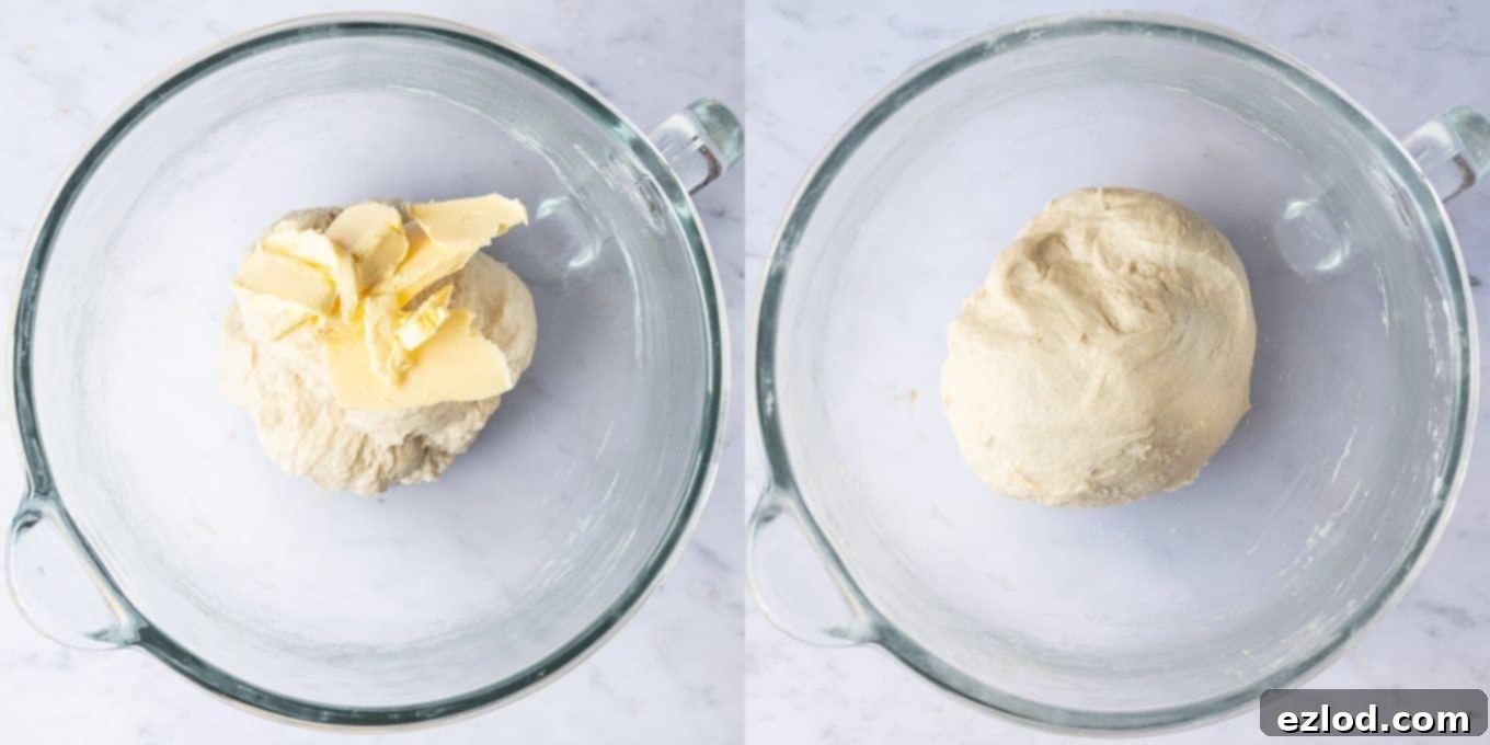Step 2: Incorporating softened vegan butter into the babka dough, demonstrating its transformation into a smooth, elastic consistency.