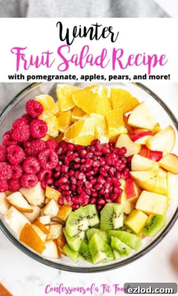 The title card for winter fruit salad shows the evenly diced fruits in a large glass bowl.