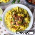 Vibrant Spiced Cauliflower and Zucchini with Turmeric Rice 6 Spiced cauliflower and courgette with yellow rice - this delicious vegan dish is easy to make, healthy and full of flavour.