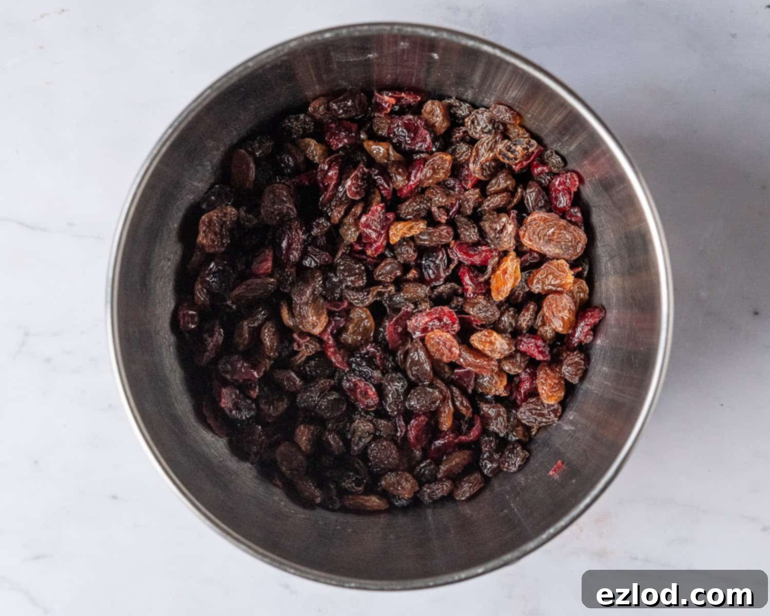 A bowl of soaked dried fruits.