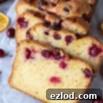 Close up of slices of orange cranberry cake.